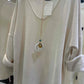 Pullover mit Kette